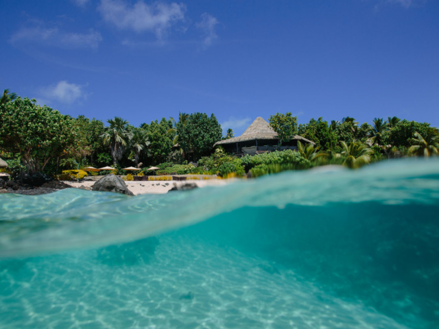 An unforgettable view of the Rapae Restaurant from the lagoon,  perched amidst the tropical lush garden