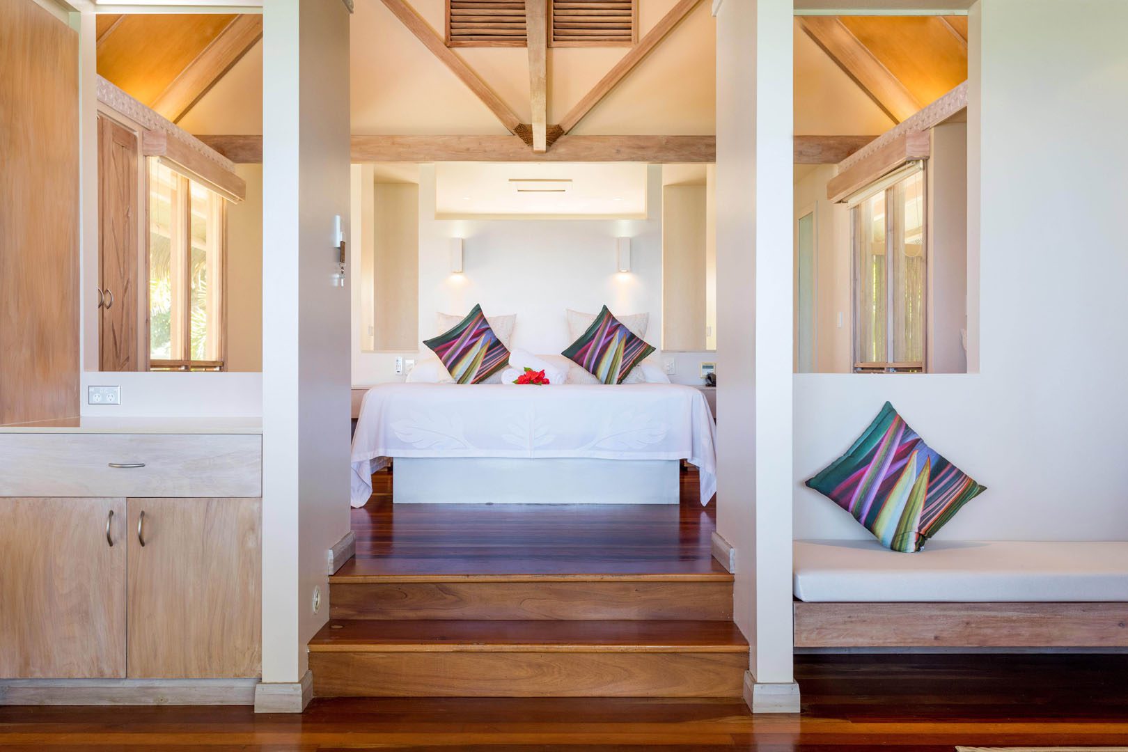 Modern & Elegant Polynesian inspired beachfront bungalow view of the bedroom