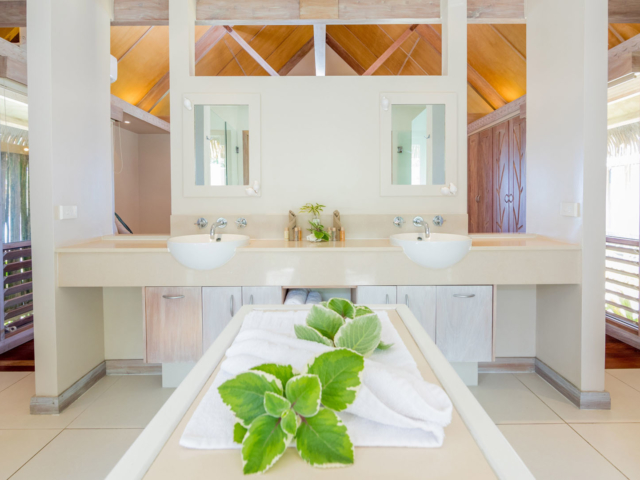 A beautiful neutral double bathroom setting