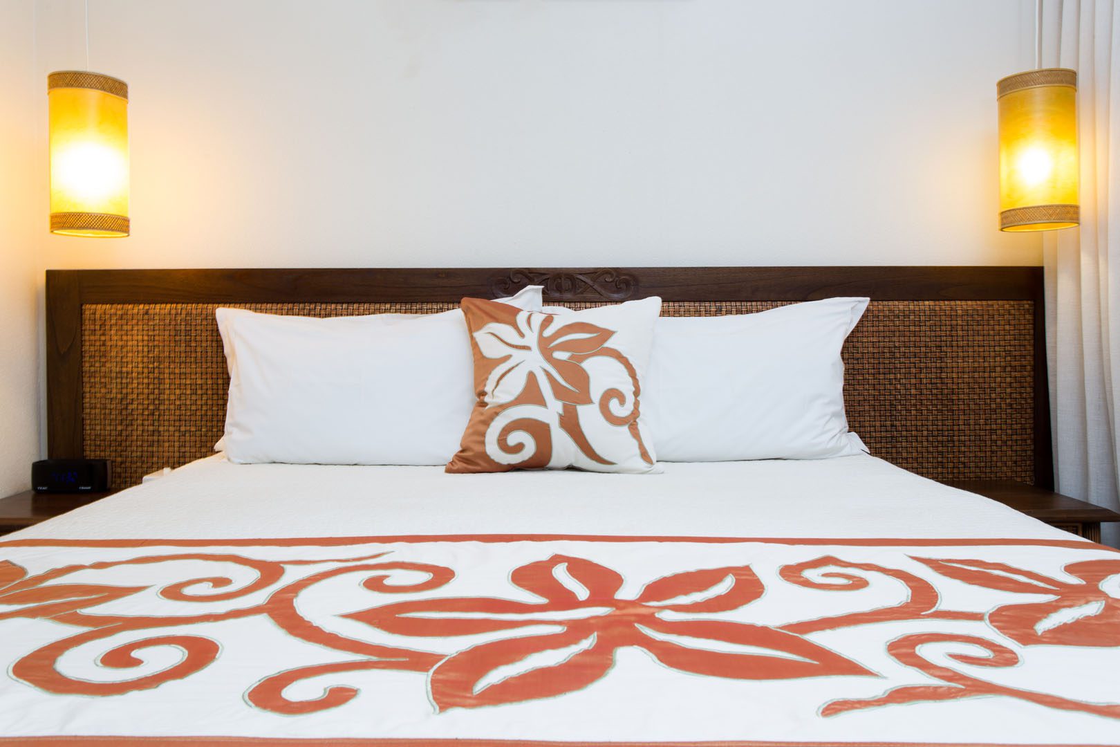 Image of Polynesian Flare between the king size bed to enhance lighting in the room