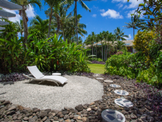 Premium Garden Villa showcasing the beautifully arranged pebble yard and the lush garden