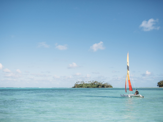 A resort guest exploring the Muri lagoon on a Sail Boat