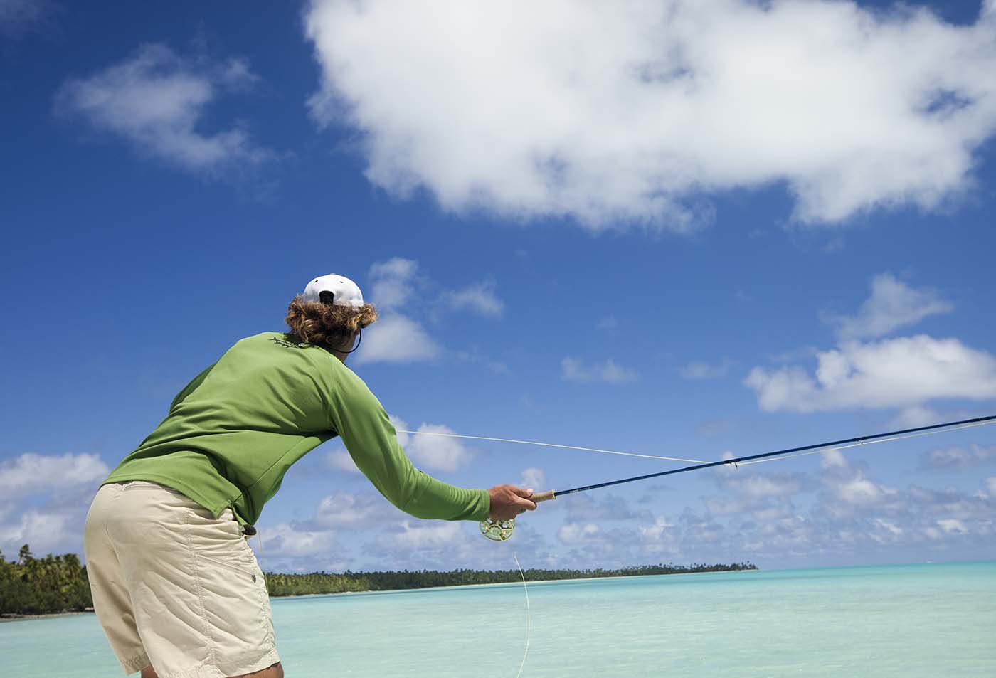 Gentleman Bonefishing in the clear blue lagoon in Aitutaki