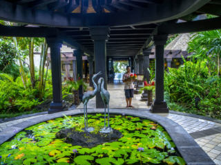 Entrance to the Resort lobby featuring two doves standing on a rock, in the lily pond which symbolizes peace and love