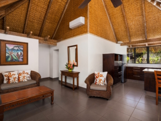 Two-bedroom living and kitchen area inside the Premium Garden Villa at Pacific Resort Rarotonga