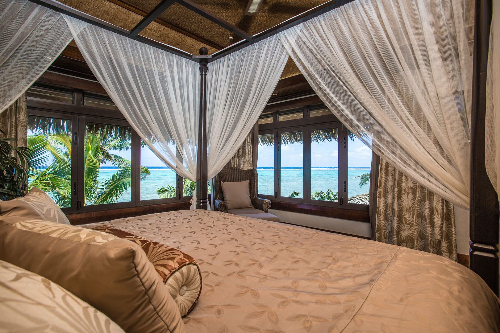 View of the elegant Presidential Beachfront Villa Bedroom overlooking the lagoon view