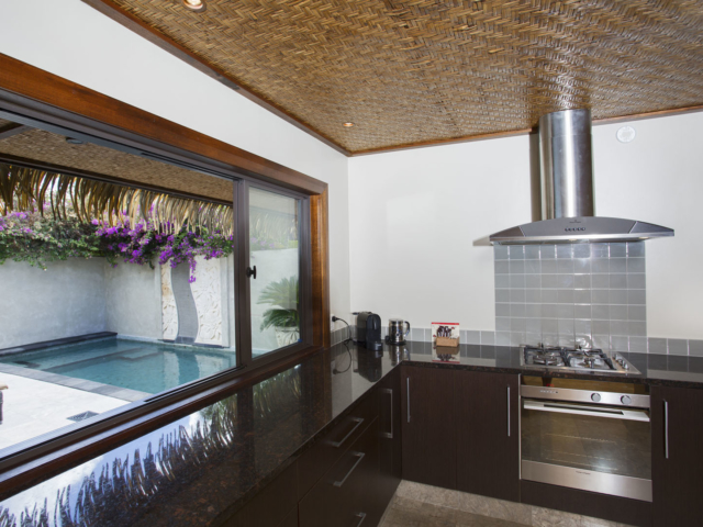 Te Manava Luxury Villas & Spa, Ultimate Beachfront Villa view of the modern Kitchen