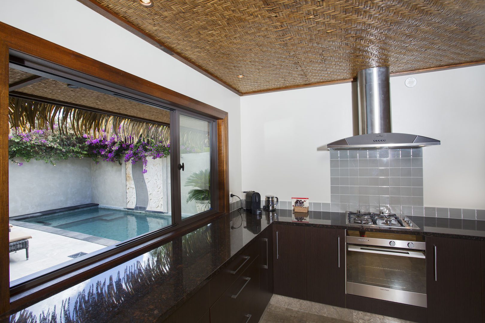 Te Manava Luxury Villas & Spa, Ultimate Beachfront Villa view of the modern Kitchen