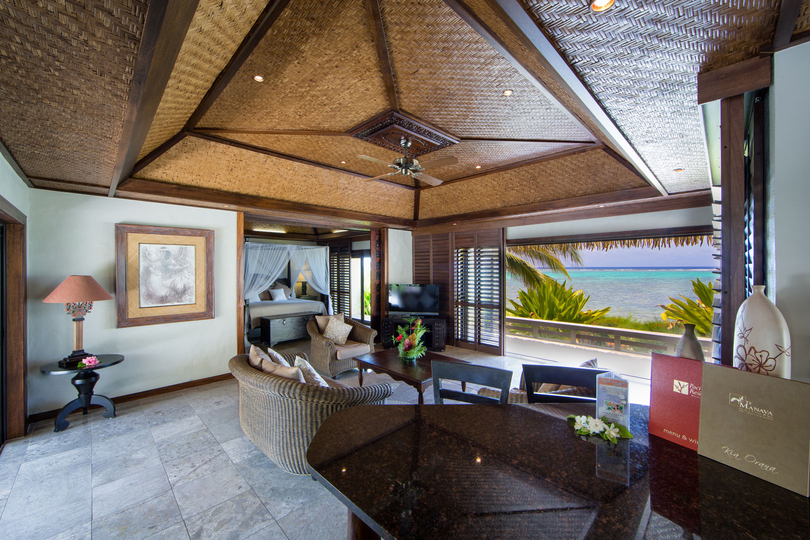 Te Manava luxury villas, view from the inside of the Ultimate beachfront villa looking out onto the blue lagoon