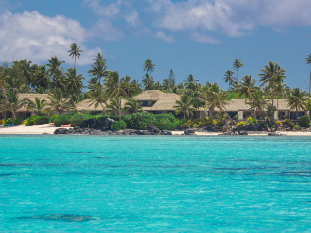 Te Manava Luxury Villas & Spa view from the blue lagoon looking back at the property on a beautiful day