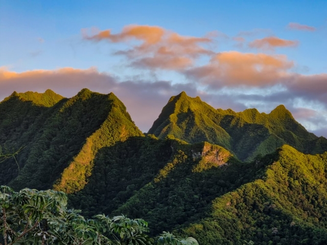 Island of Rarotonga mountains and sunset in the background
