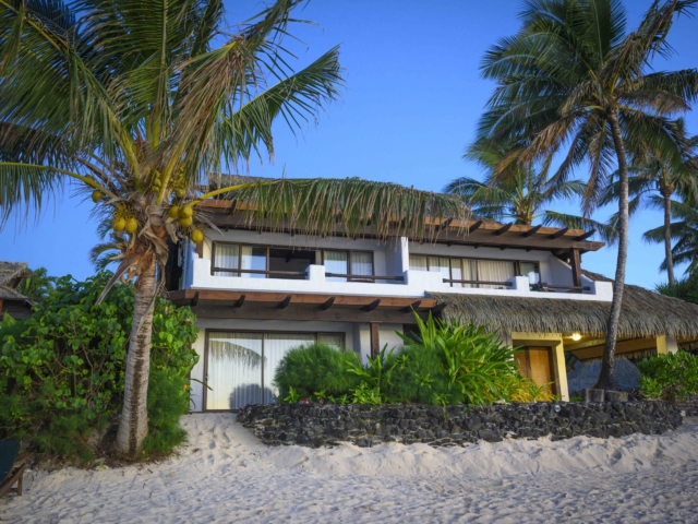 Premium Beachfront Suite view from the beach overlooking a clear blue sky in the background