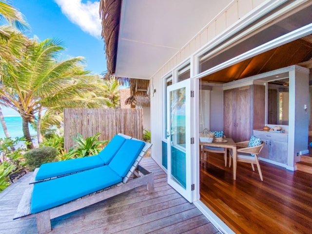 Private patio of a Beachfront Bungalow at Little Polynesian Resort Rarotonga overlooking the lagoon