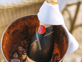 A champagne beautifully set in an ice bucket