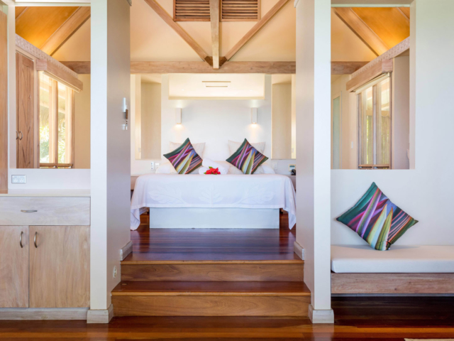 Modern & Elegant Polynesian inspired beachfront bungalow view of the bedroom