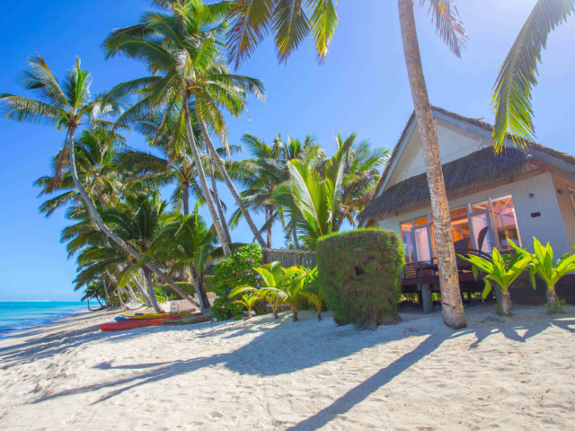 View from the outside of our beachfront bungalow room and decking located on the beach