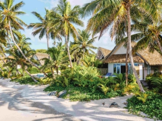 Little Polynesian Beachfront Bungalow overlooking the beach and lagoon in Rarotonga